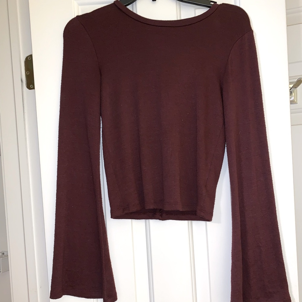 American eagle open back with flare arms